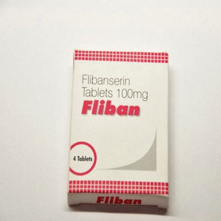 Acheter Flibanserin - pilule sur fond bleu