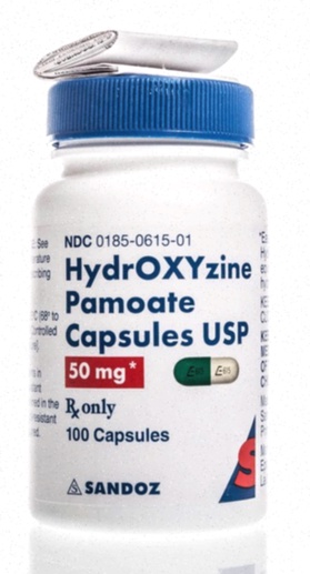 Acheter Hydroxyzine - Comprimés d’hydroxyzine sur fond blanc