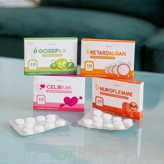 Acheter Reglan - Illustration d'un tube de Reglan et d'une main faisant une commande en ligne